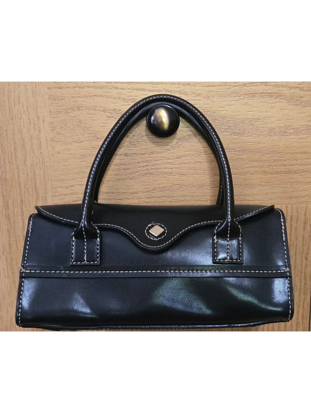 Emilie M. Black Leather Small Handbag with White Stitching and Gold-tone Clasp